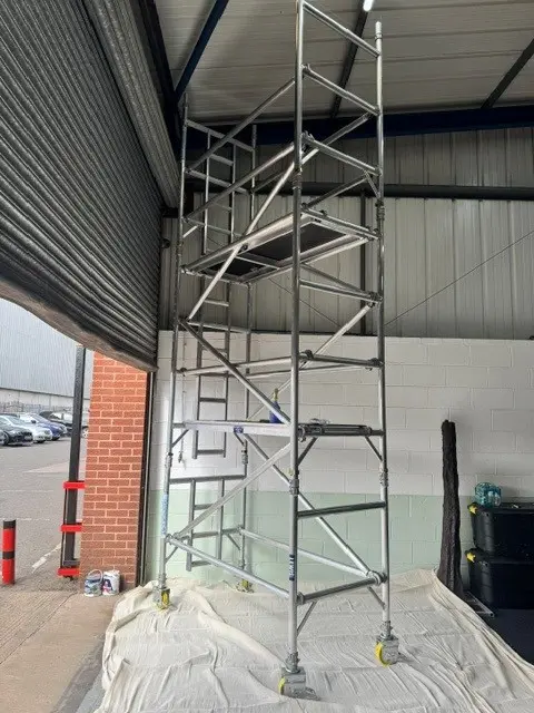 Mobile access tower used during high-level preparation work